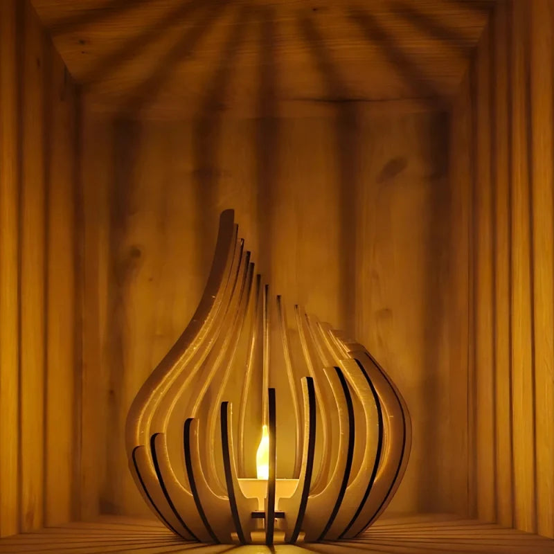 Handcrafted teardrop wooden candle holder with hollow design casting delicate shadows, available in small, medium, and l 3