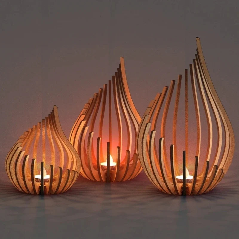 Handcrafted teardrop wooden candle holder with hollow design casting delicate shadows, available in small, medium, and l 4