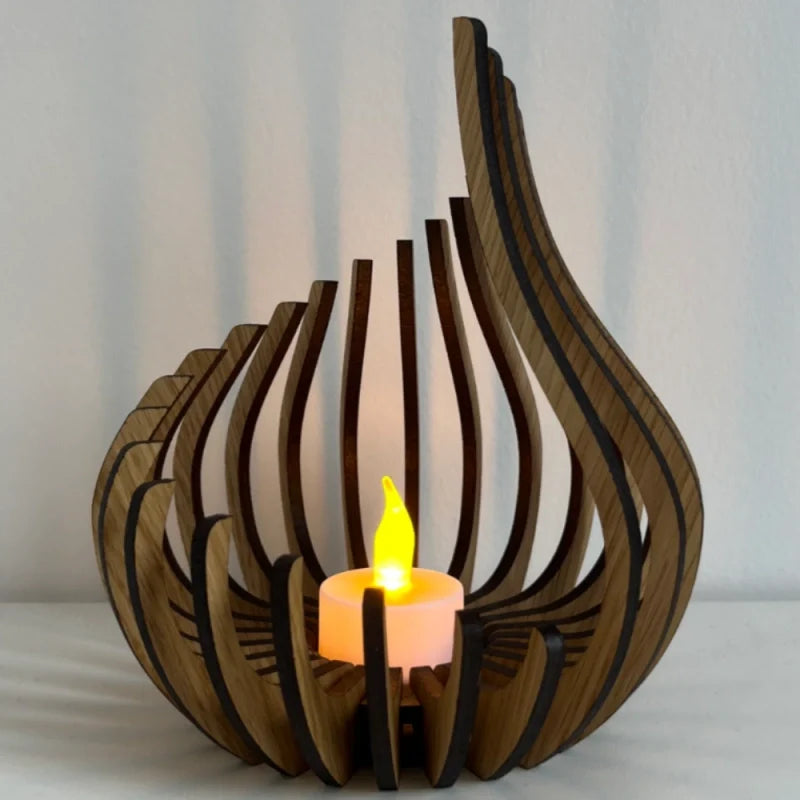 Handcrafted teardrop wooden candle holder with hollow design casting delicate shadows, available in small, medium, and l 7
