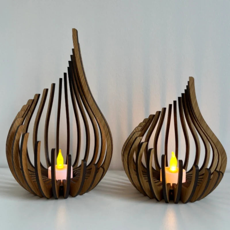 Handcrafted teardrop wooden candle holder with hollow design casting delicate shadows, available in small, medium, and l 8