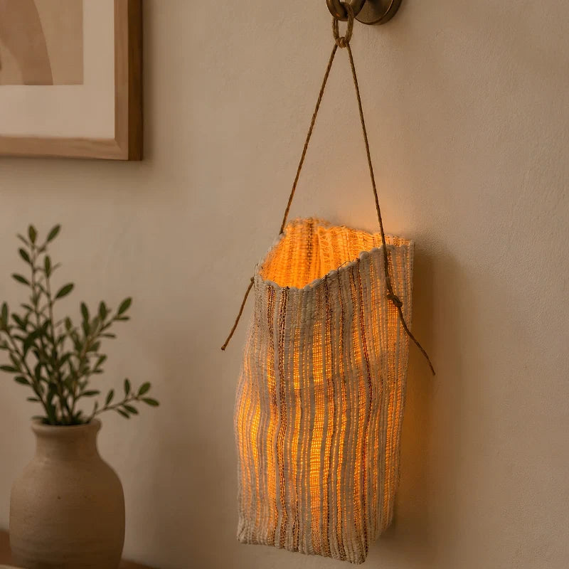 Handwoven natural fiber lantern with warm white flickering light and handle for display 11