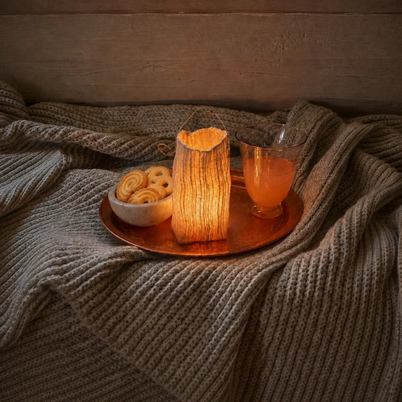 Handwoven natural fiber lantern with warm white flickering light and handle for display 9