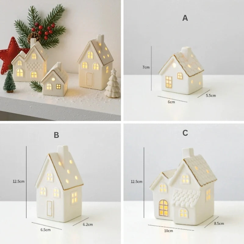 Illuminated ceramic village set with white houses, snowmen, and fir trees with warm glowing windows 11
