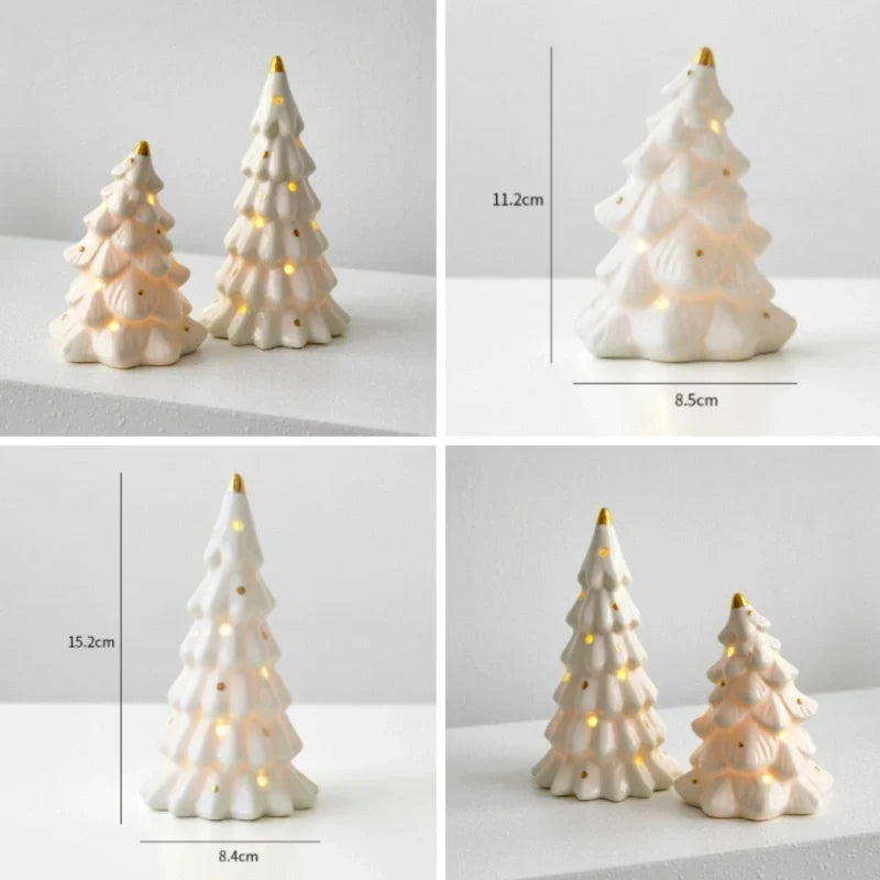Illuminated ceramic village set with white houses, snowmen, and fir trees with warm glowing windows 15