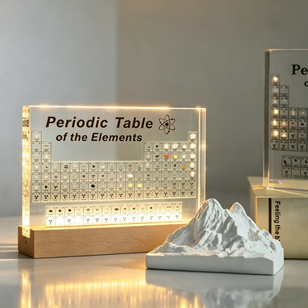 Illuminated periodic table display with 83 real element samples in crystal-clear acrylic with warm LED lighting and natu 2