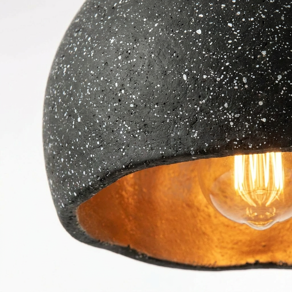 Stylish industrial cement pendant light with warm copper interior. 5