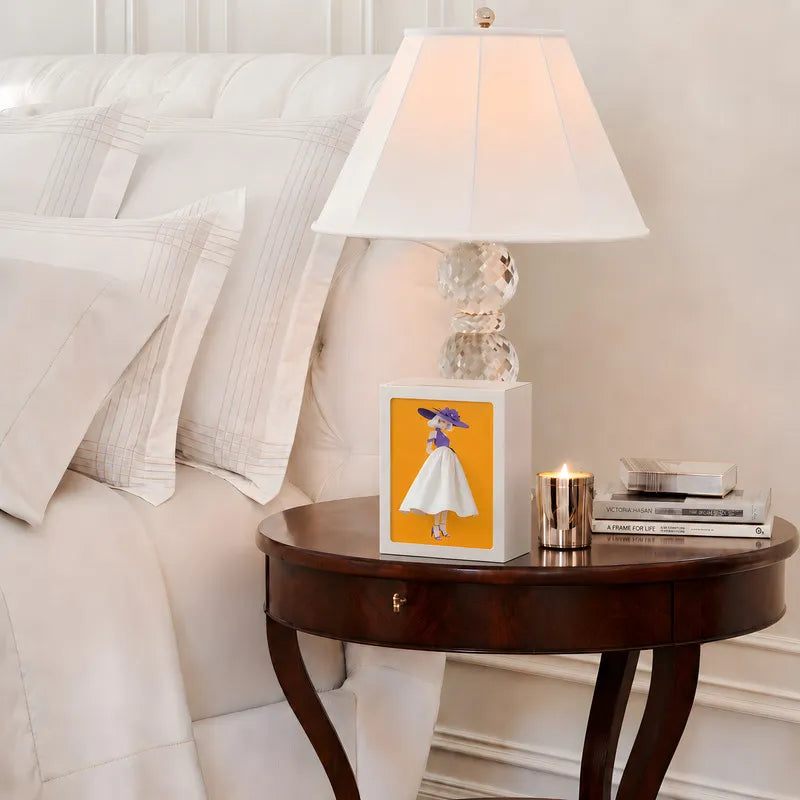 Interactive artistic tissue box with touch-sensitive ambient glow lighting and fashion-inspired illustration design 13