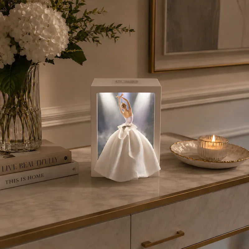 Interactive artistic tissue box with touch-sensitive ambient glow lighting and fashion-inspired illustration design 2