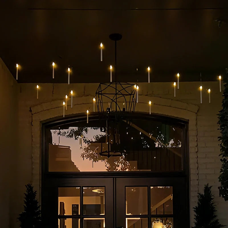 Spellbound floating candles hovering in air with magic wand remote control glowing warm light 10