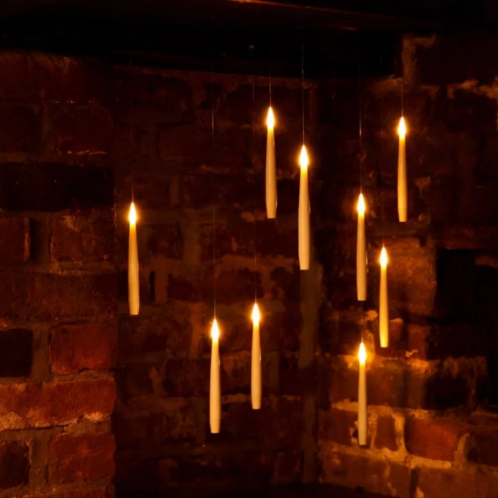 Spellbound floating candles hovering in air with magic wand remote control glowing warm light 5