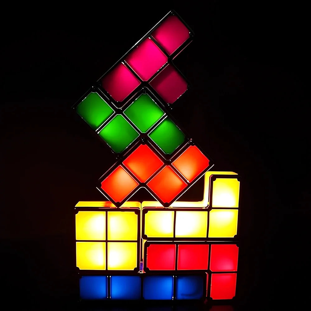 Interactive Tetra Blocks Light - seven colorful stackable LED blocks forming glowing composition