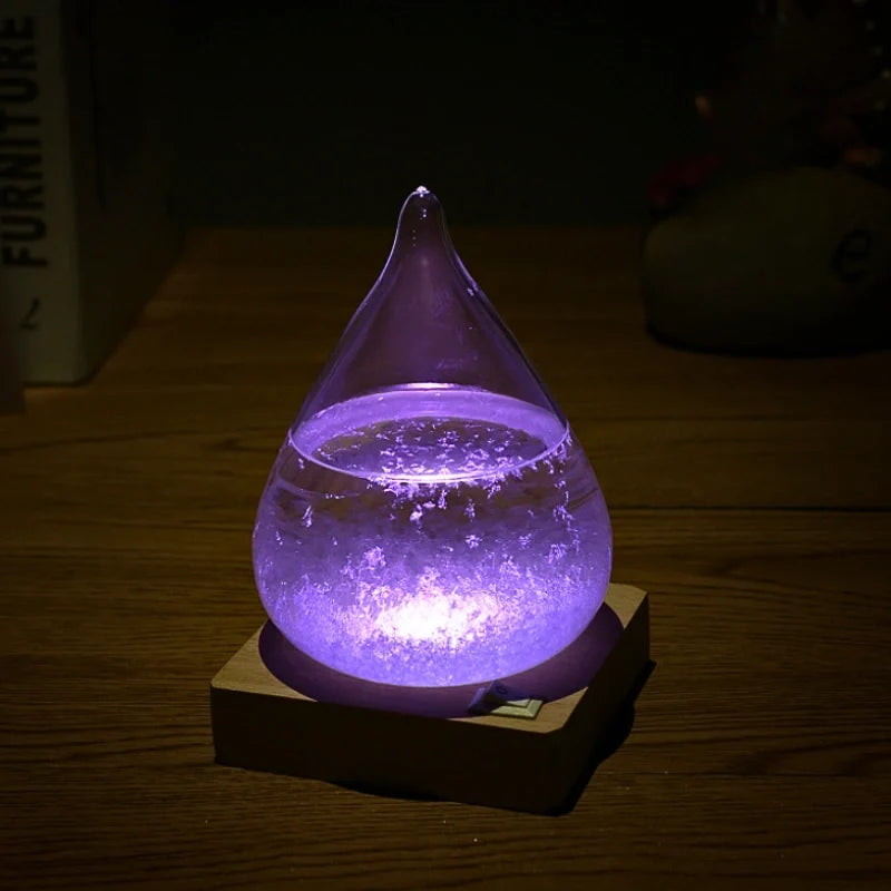 Interactive weather glow display with crystal formation, glass vessel on wooden base with seven-color LED lighting