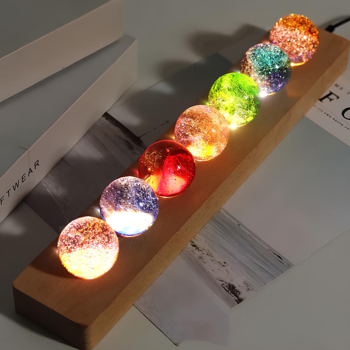Set of seven luminous crystal galaxy orbs on wooden base with USB-powered LED lighting 5