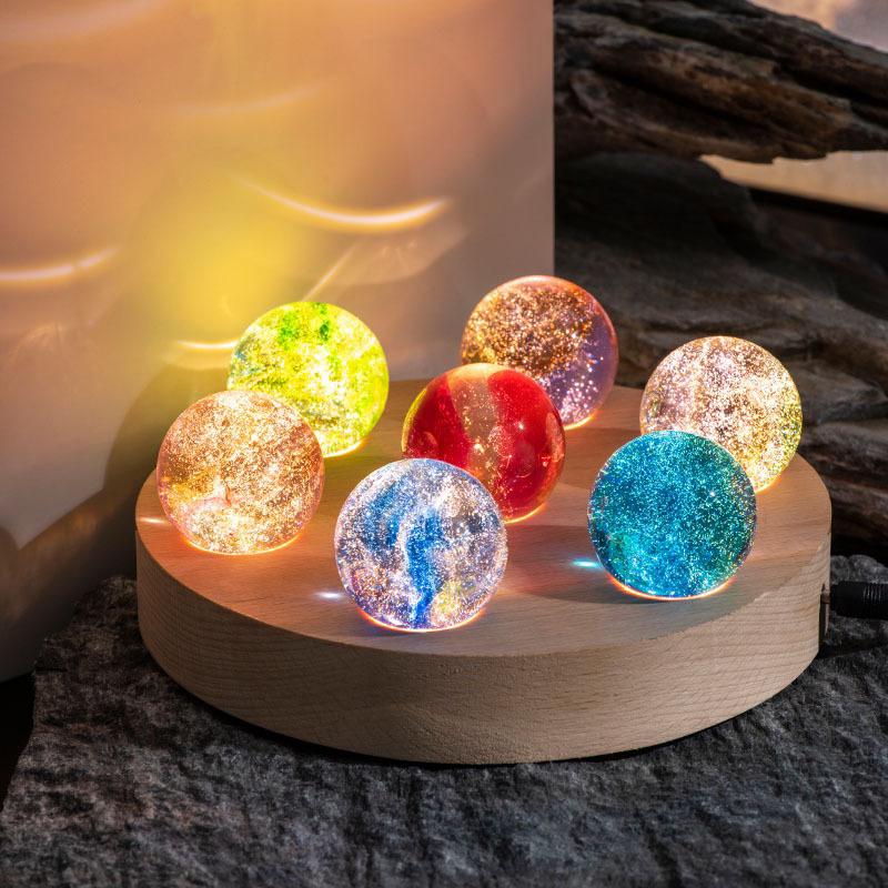 Set of seven luminous crystal galaxy orbs on wooden base with USB-powered LED lighting 7