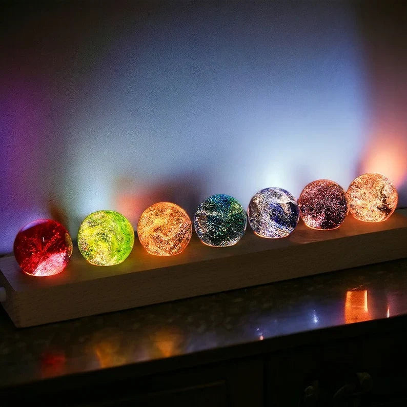 Set of seven luminous crystal galaxy orbs on wooden base with USB-powered LED lighting 8