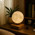 Magnetic levitating planet lamp hovering and rotating above its base with soft ambient glow 2