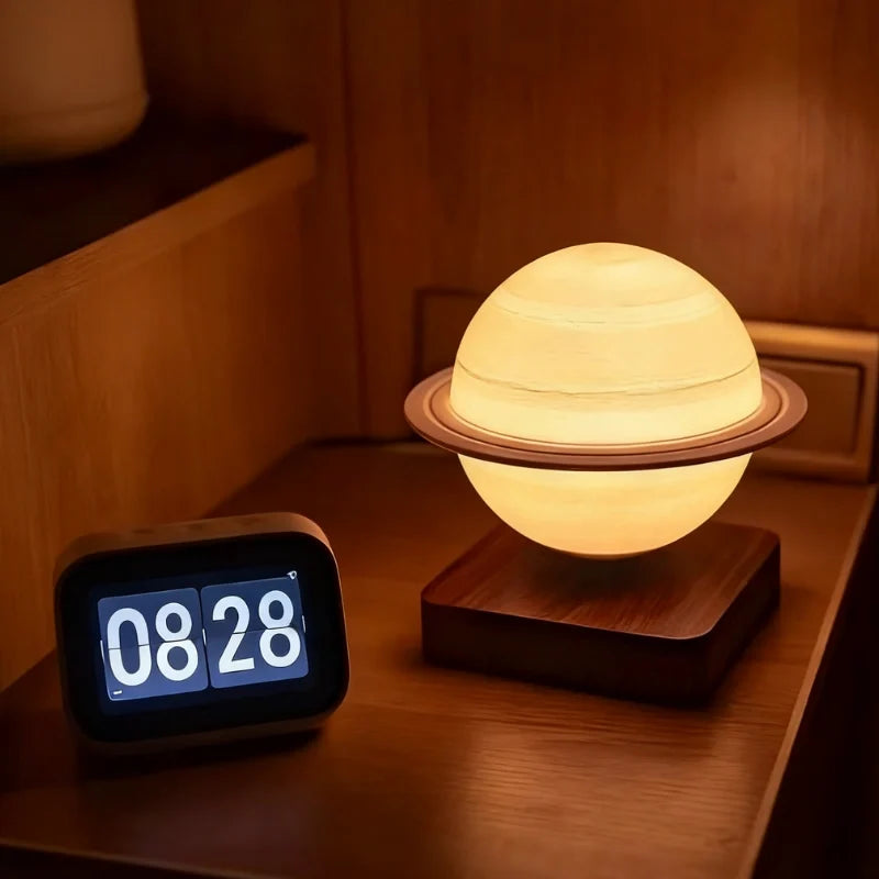 Magnetic levitating planet lamp hovering and rotating above its base with soft ambient glow 5