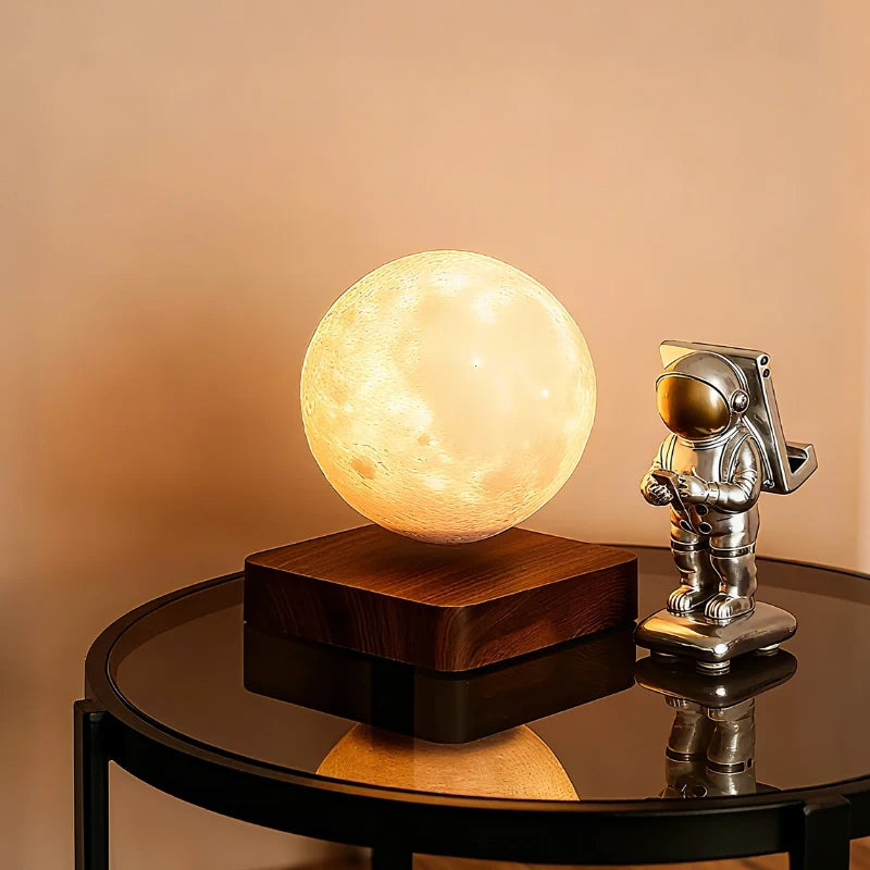 Magnetic levitating planet lamp hovering and rotating above its base with soft ambient glow 6
