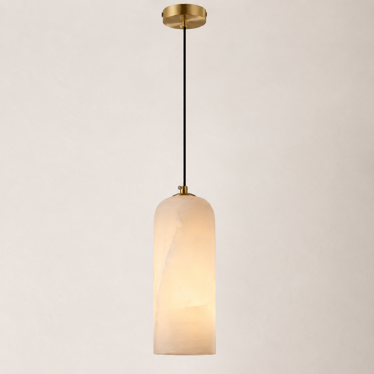 Elegant marble and copper pendant lamp for stylish lighting.