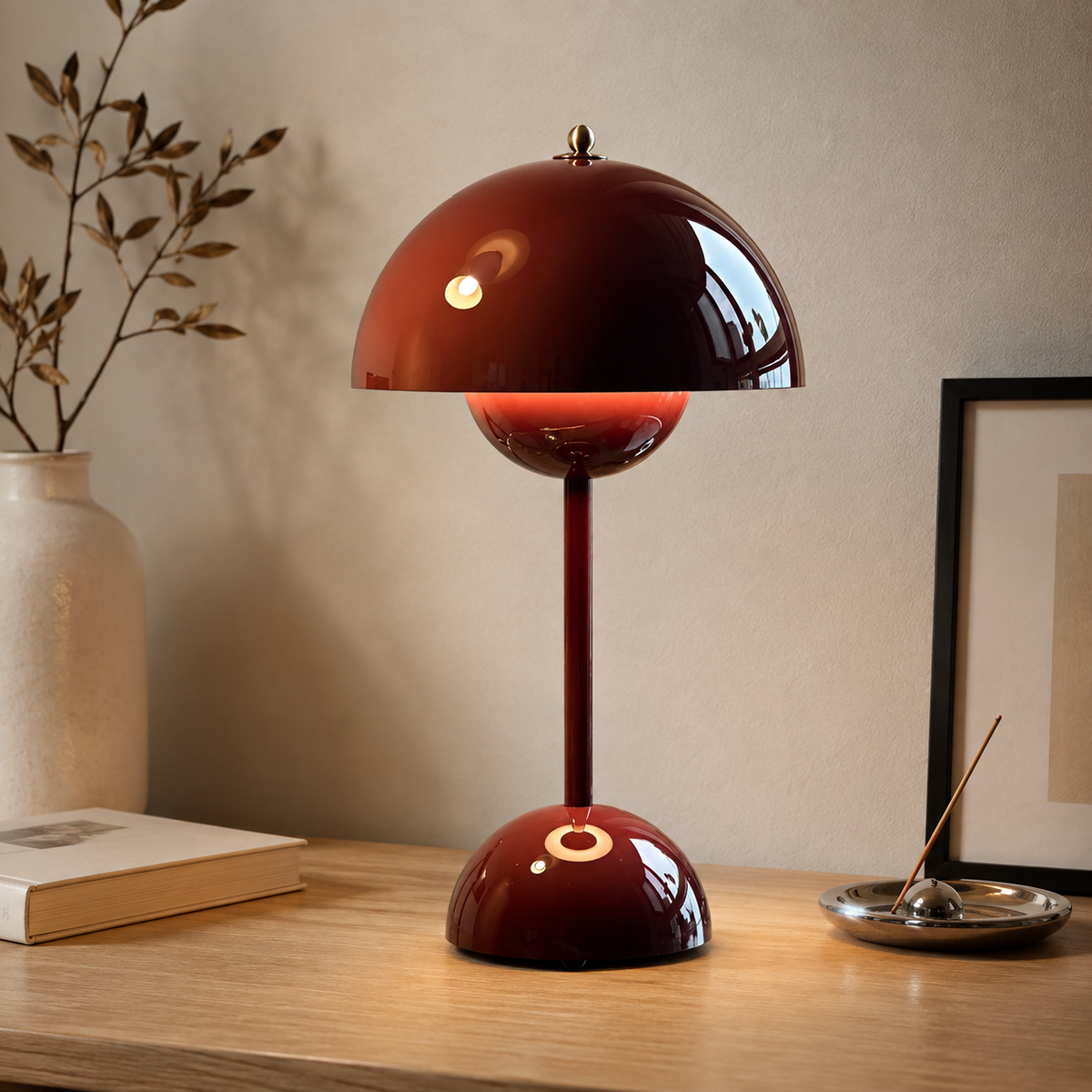 Stylish cordless table lamp with a rounded bud-like dome and touch control. 5