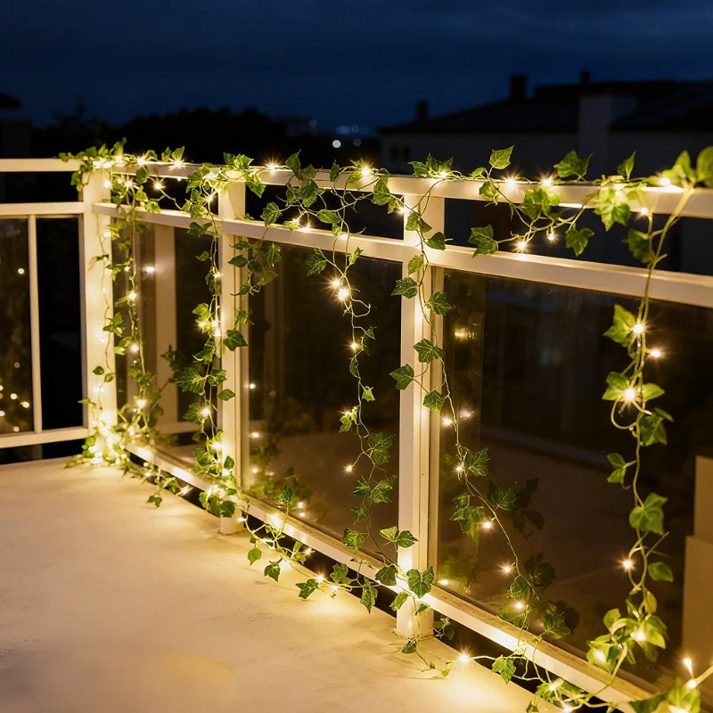 Botanical garland light string with warm white glow and natural foliage design 10