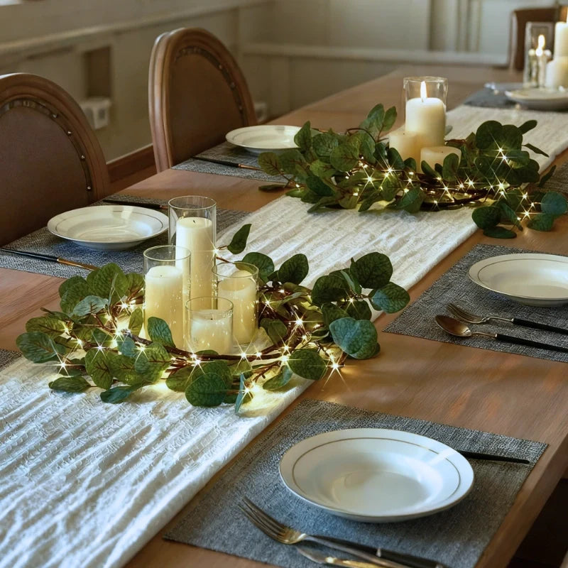 Botanical garland light string with warm white glow and natural foliage design 11