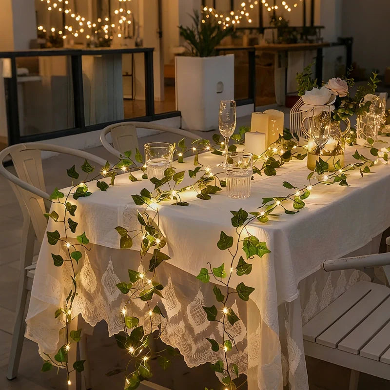 Botanical garland light string with warm white glow and natural foliage design 15