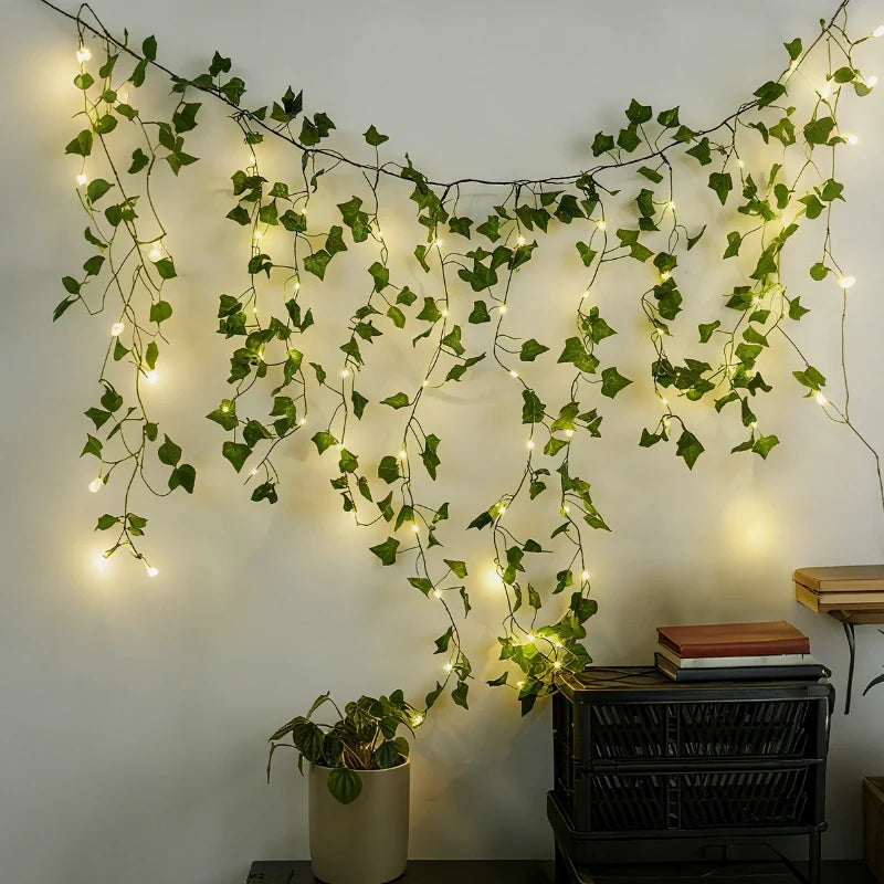 Botanical garland light string with warm white glow and natural foliage design 24
