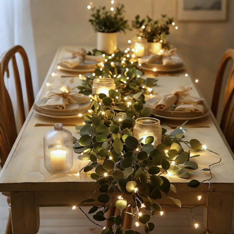 Botanical garland light string with warm white glow and natural foliage design 4
