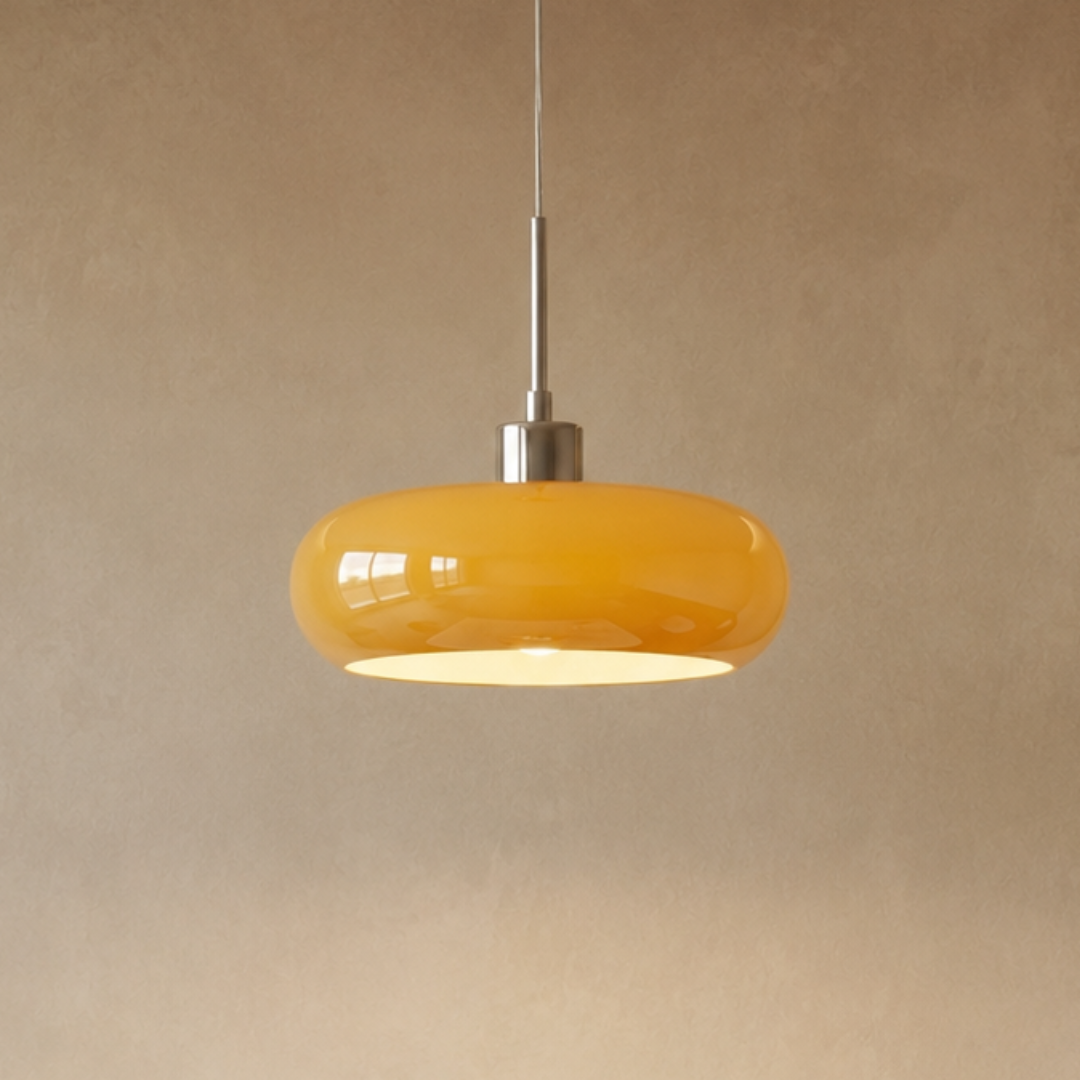 Elegant pebble pendant lamp casting warm light.