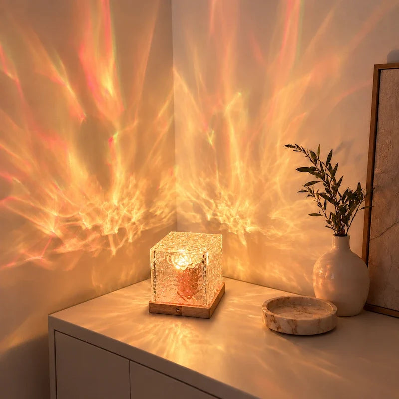 Prismatic Northern Lights Cube casting dynamic colorful ambient light from a wooden base 13