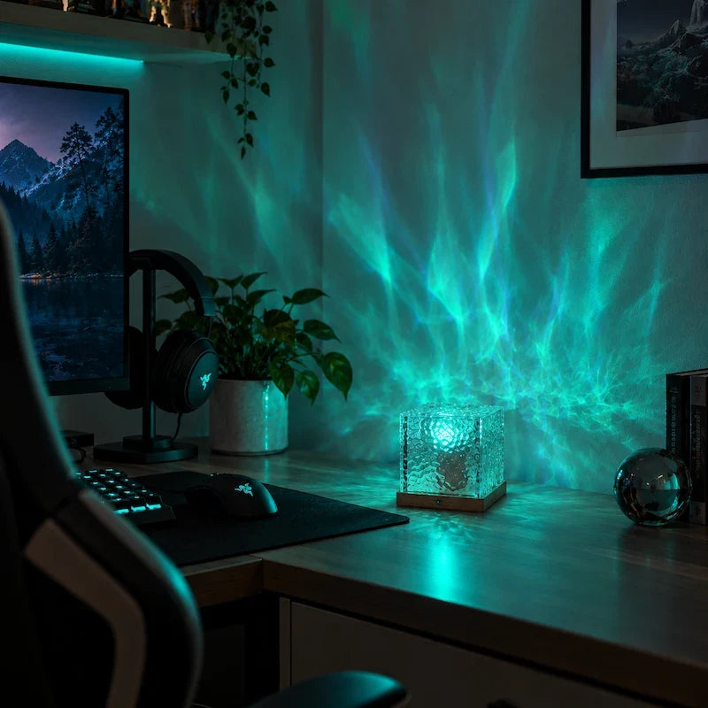 Prismatic Northern Lights Cube casting dynamic colorful ambient light from a wooden base 14