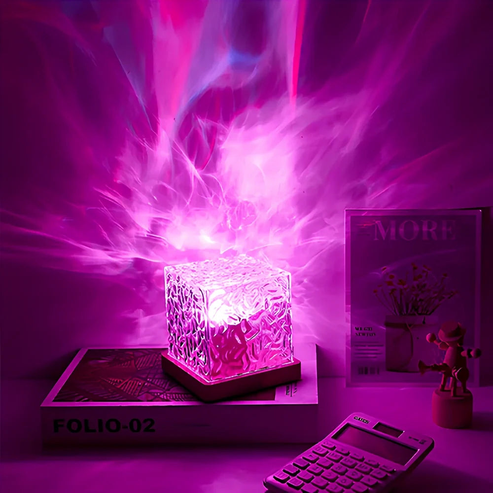 Prismatic Northern Lights Cube casting dynamic colorful ambient light from a wooden base 9