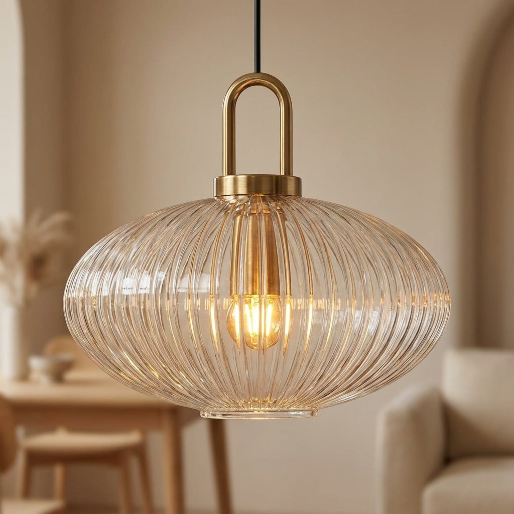 Sculptural ribbed glass pendant light for decorative use.