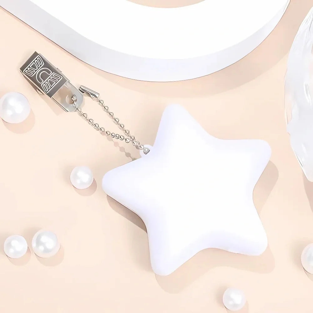 Compact touch-activated purse light illuminating a dark handbag interior. 11