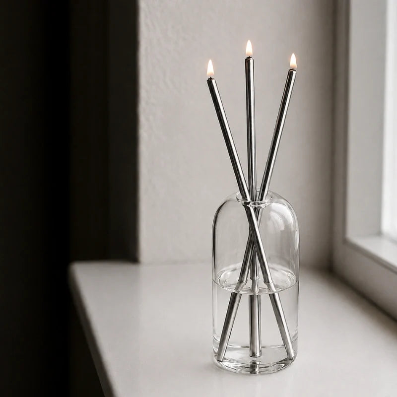 Refillable Everlasting Flame oil candle with clear glass vessel and stainless steel details 9