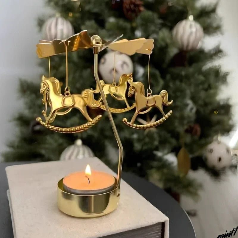 Rotating golden candle carousel with spinning ornaments creating warm reflections 10
