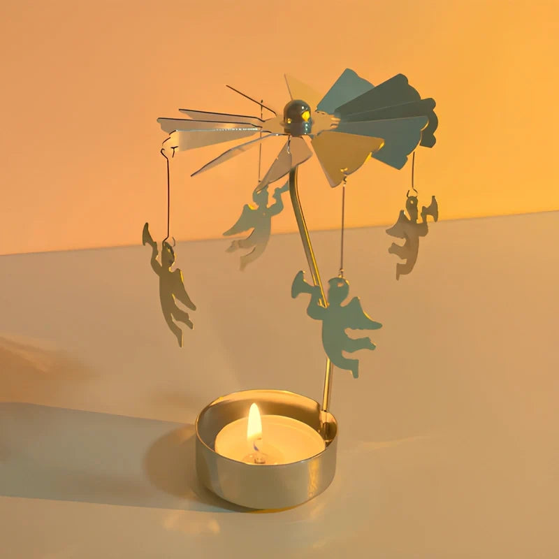 Rotating golden candle carousel with spinning ornaments creating warm reflections 19