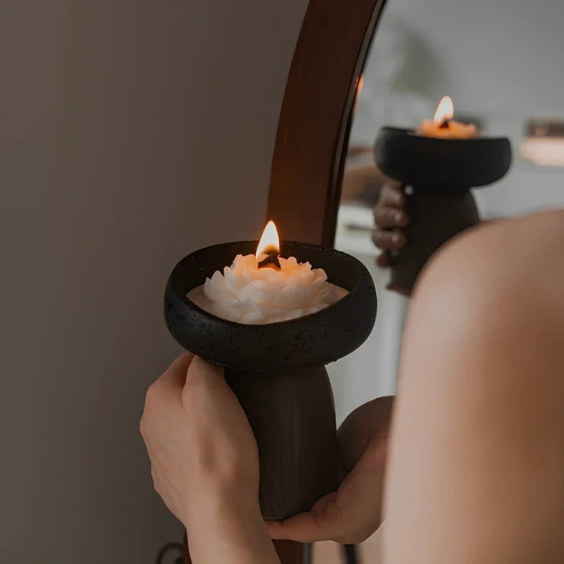 Sculptural cement and wood candle holder with textured volcanic-inspired design 16