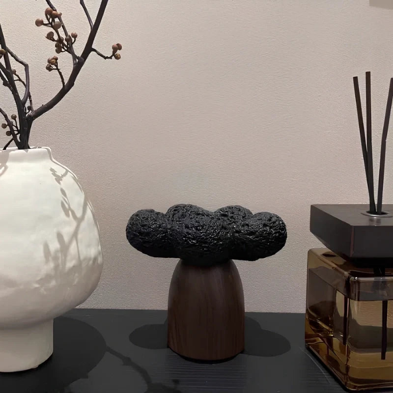 Sculptural cement and wood candle holder with textured volcanic-inspired design 17