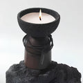 Sculptural cement and wood candle holder with textured volcanic-inspired design 3
