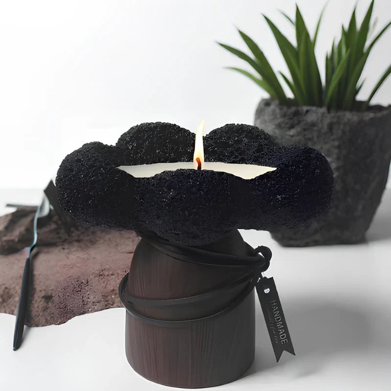 Sculptural cement and wood candle holder with textured volcanic-inspired design 9