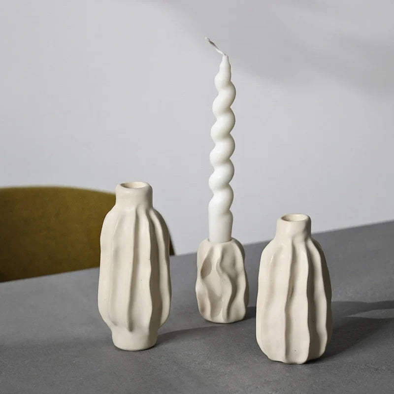 Sculptural ceramic candle holder with rippled matte finish design in neutral tone 6