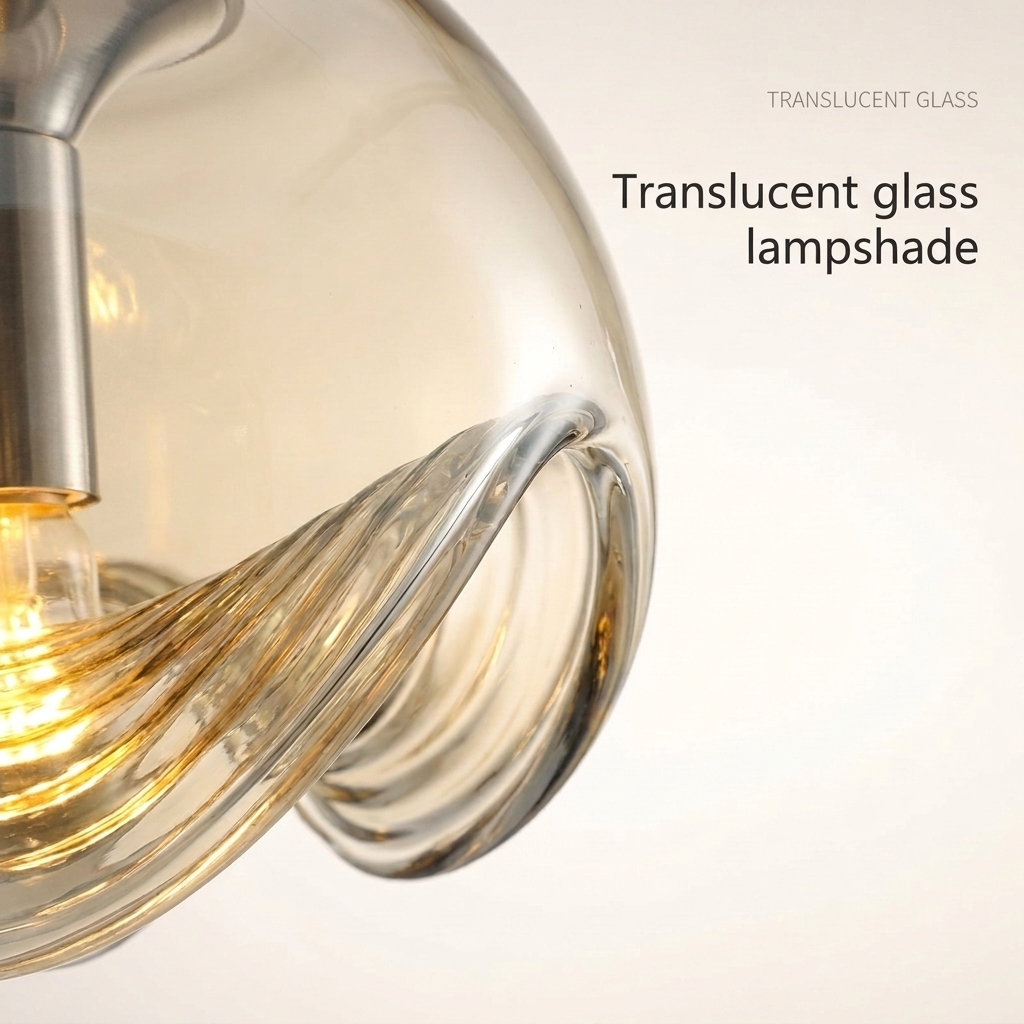Sculptural glass globe pendant light hanging from the ceiling. 5