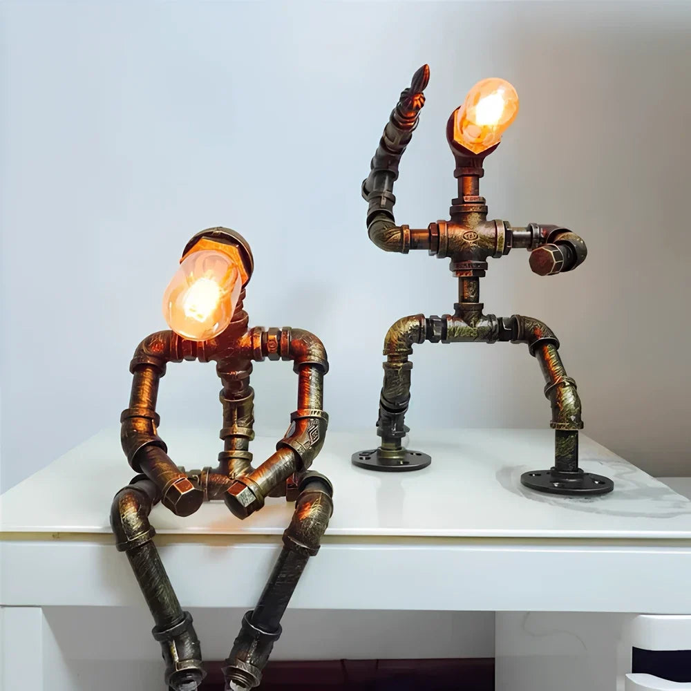 Sculptural Steampunk Sentinel Light crafted from iron pipes with exposed vintage bulb 10