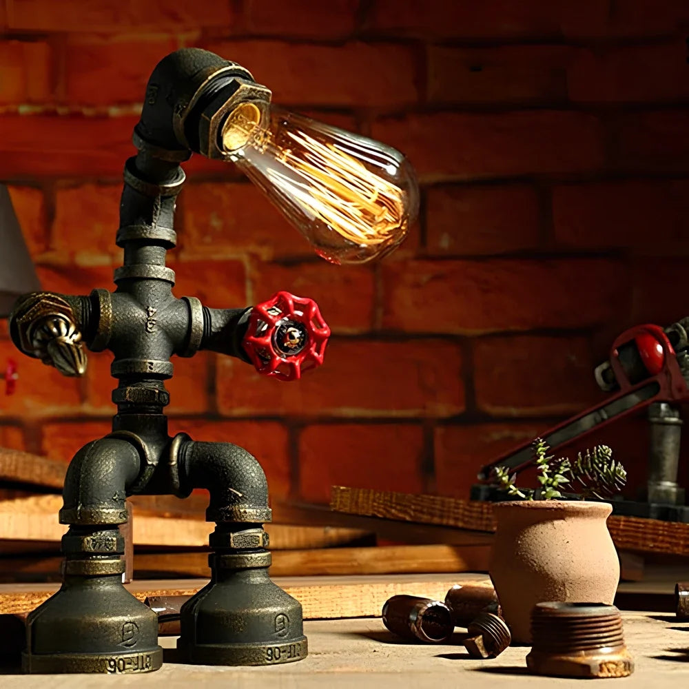 Sculptural Steampunk Sentinel Light crafted from iron pipes with exposed vintage bulb 12