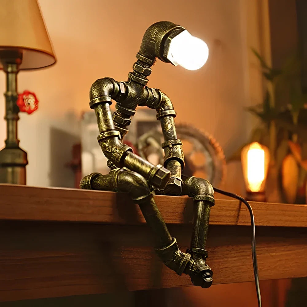 Sculptural Steampunk Sentinel Light crafted from iron pipes with exposed vintage bulb 6