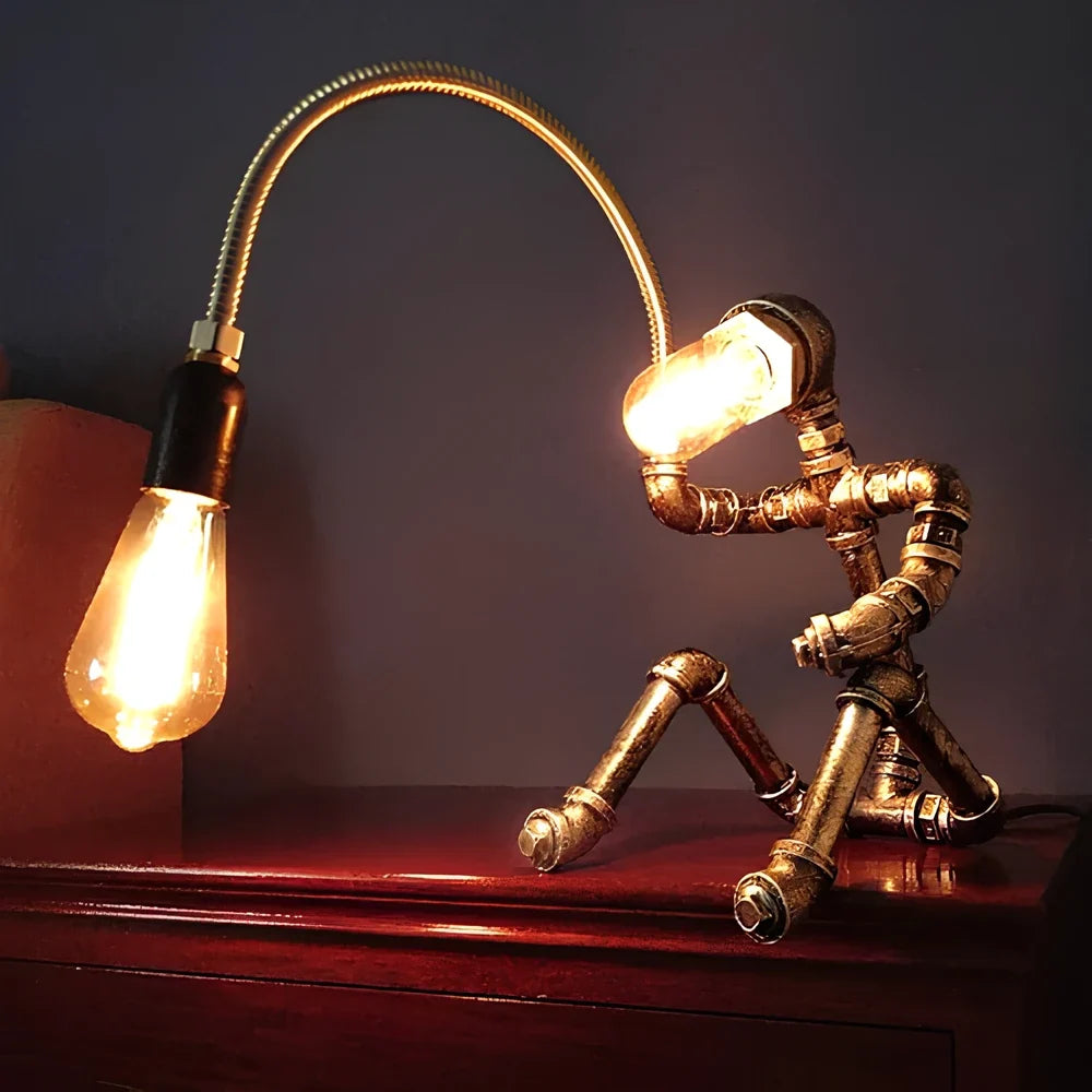 Sculptural Steampunk Sentinel Light crafted from iron pipes with exposed vintage bulb 7