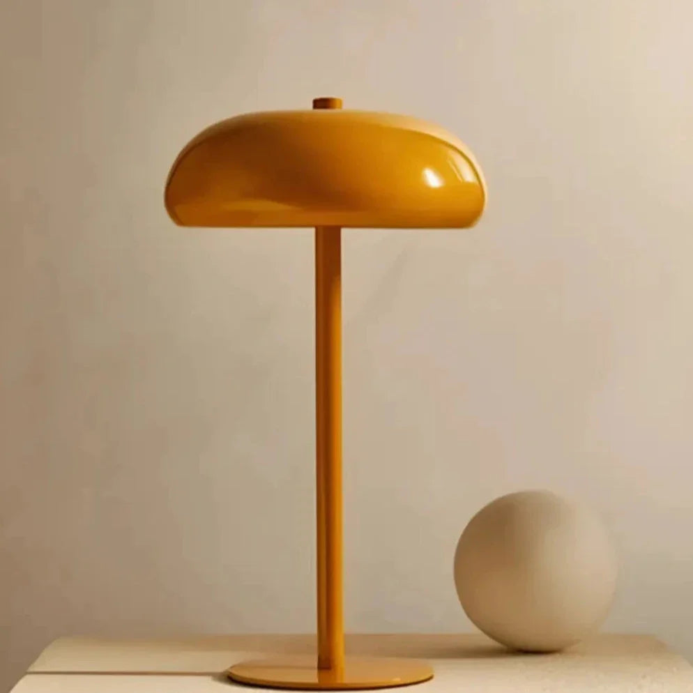 Sleek rechargeable retro table lamp with rounded top and touch control, emitting warm white light 8
