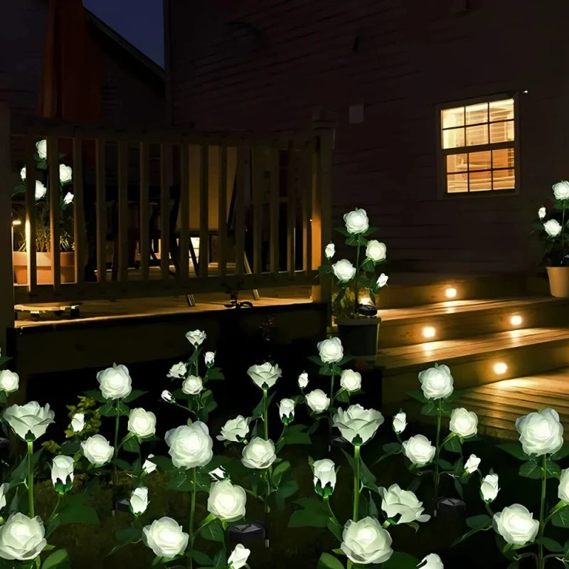 Solar flower lights with realistic blooms in warm and cool white colors for garden decoration 10